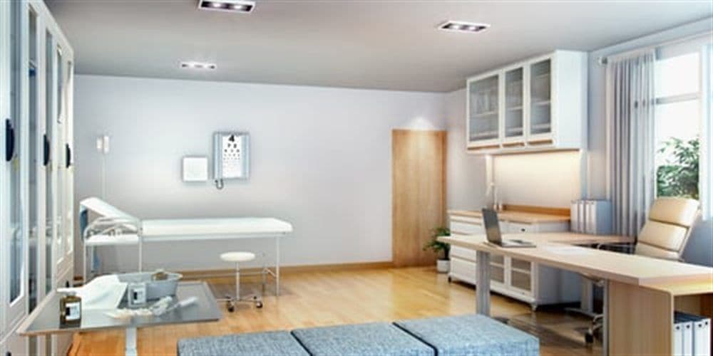 Clean, bright medical exam room serviced by AHC clinic cleaning in Crystal Lake, IL