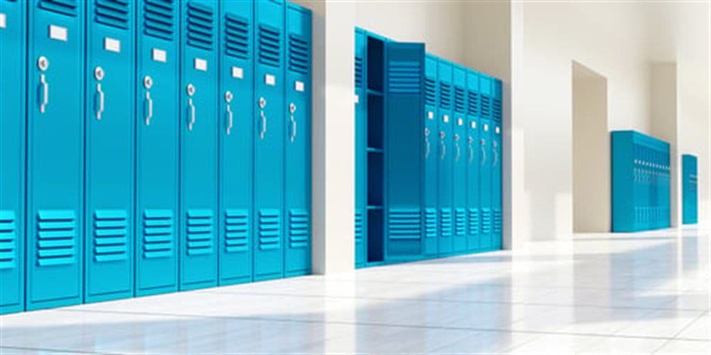 Polished school corridor with lockers cleaned by AHC school cleaning services in Illinois