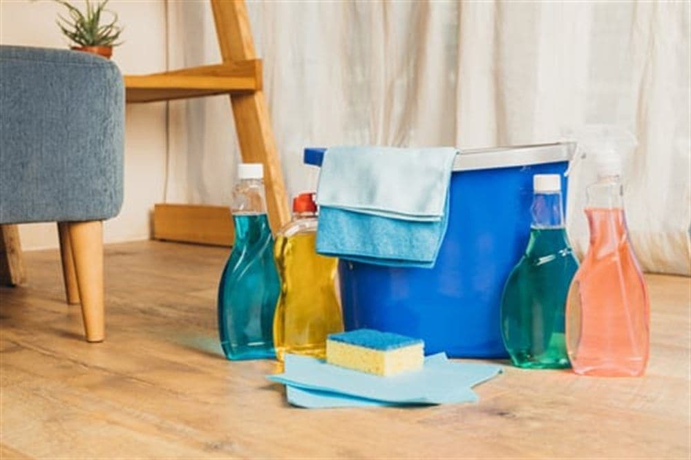 AHC cleaning supplies set up inside a Crystal Lake home